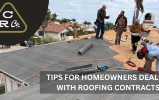 Roofers installing new roofing on a house with multiple workers and tools.