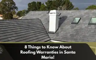 Roofers inspecting a gray shingle roof with dormers and skylights, showcasing craftsmanship and architectural detail.